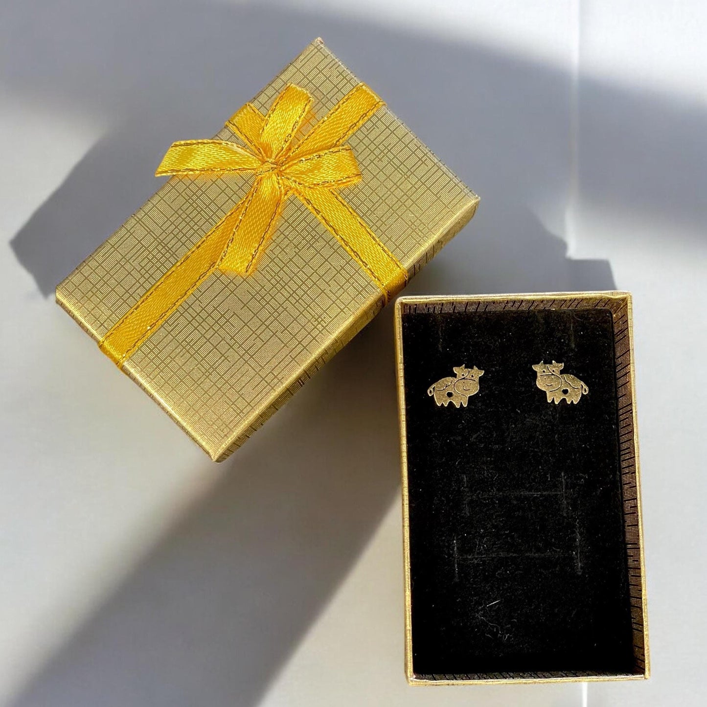 Cow stud earrings