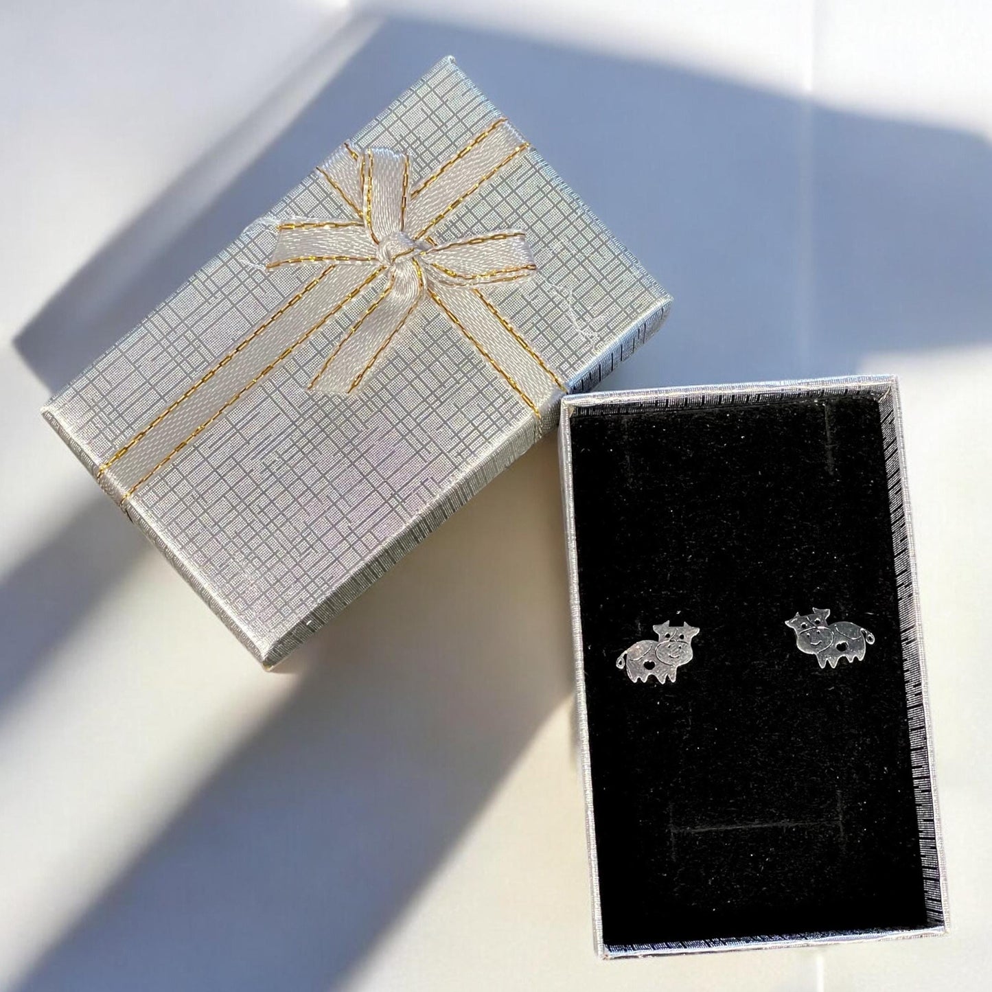 Cow stud earrings