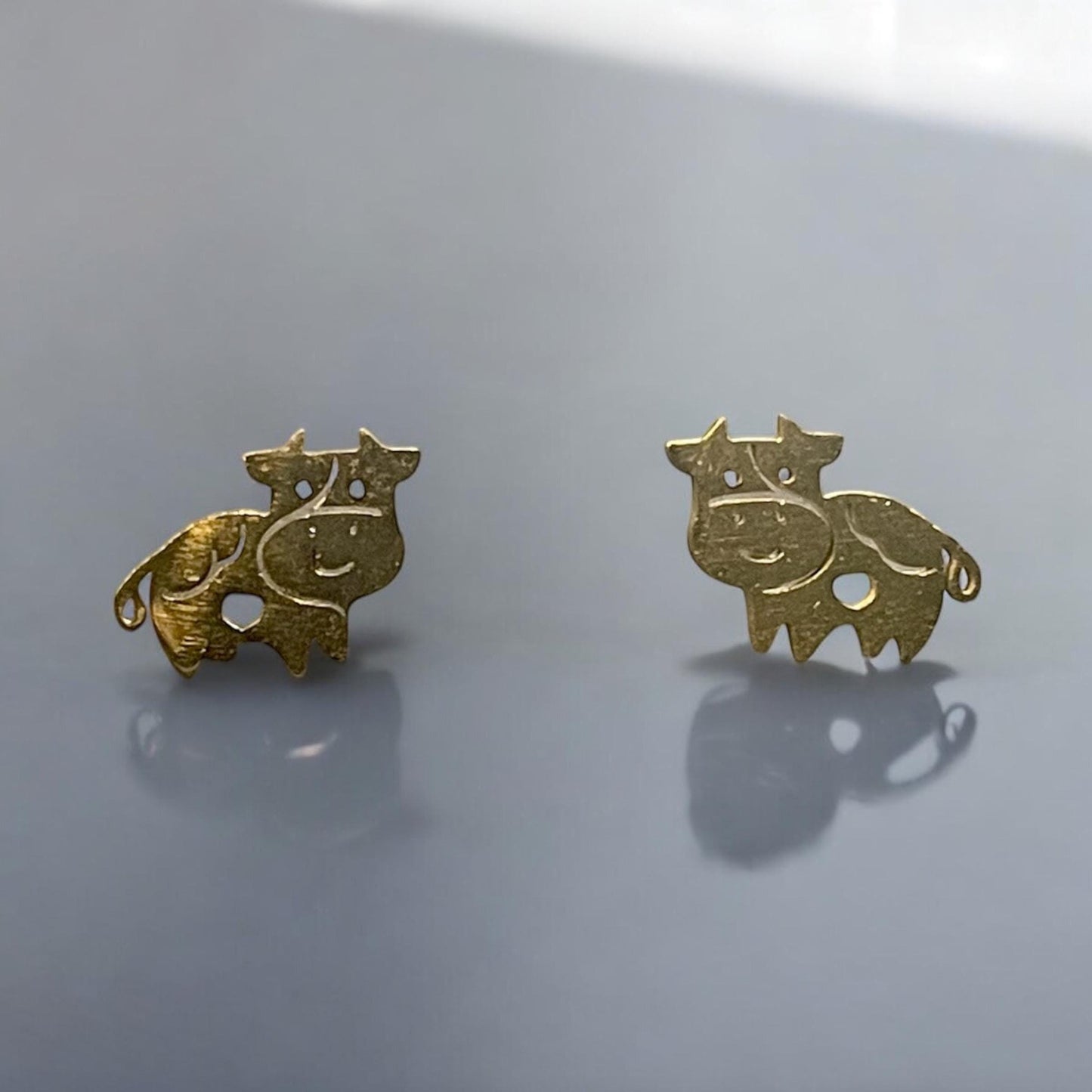 Cow stud earrings