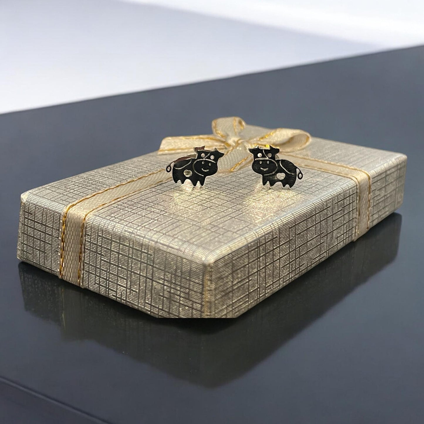 Cow stud earrings